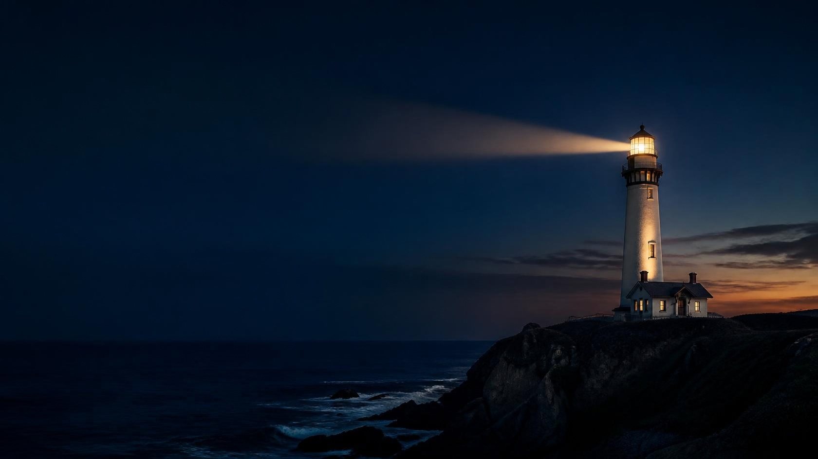 A lighthouse at dusk, the Annuity Benchmark symbol for an independent guide